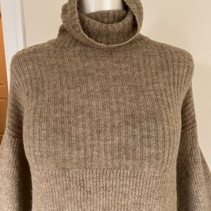 Soft turtleneck sweater dress with shift silhouette. Very cozy.